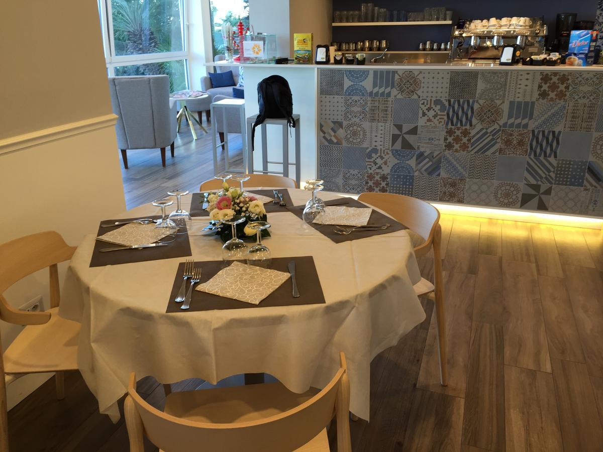 סניגליה Hotel Tritone מראה חיצוני תמונה